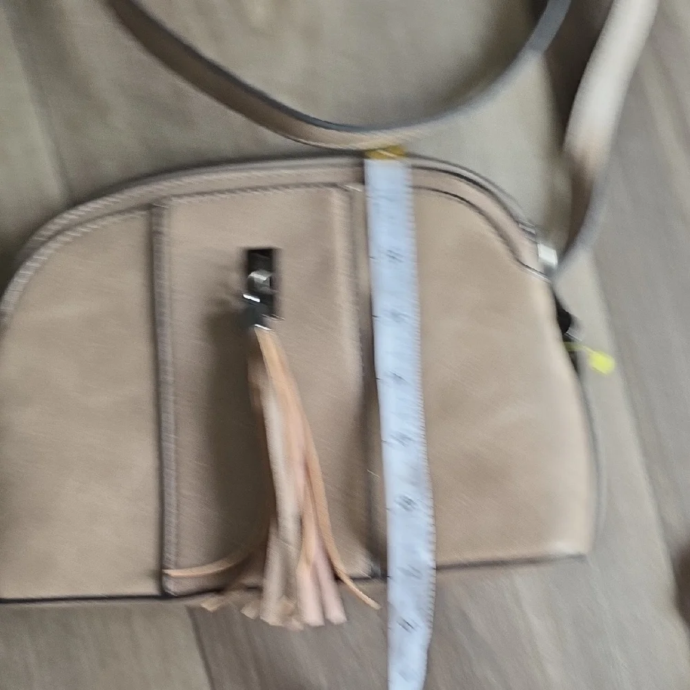 Elegant Taupe Crossbody Bag with Tassel
